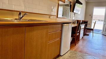 Minibar, desk, laptop workspace, blackout drapes