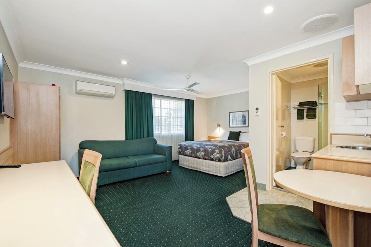 Minibar, desk, laptop workspace, blackout curtains