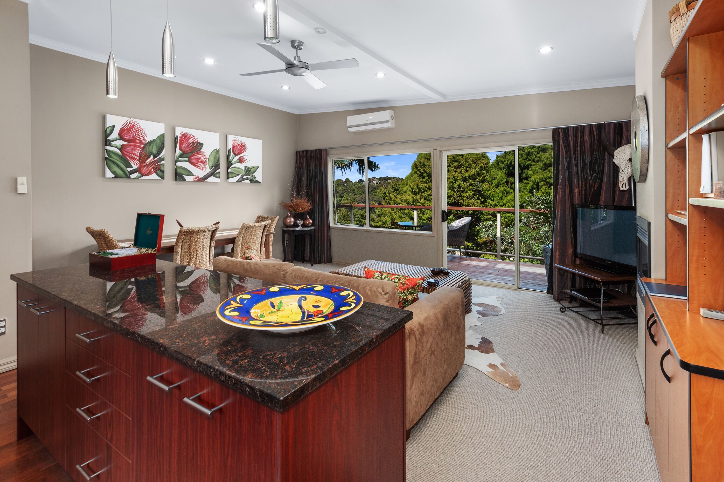 The Pacifika Suite | Living area | 40-inch flat-screen TV with satellite channels, TV, fireplace