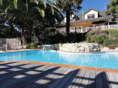 Seasonal outdoor pool, pool loungers. Havelock House