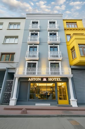 A multi-story hotel with a prominent 'ASTON HOTEL' sign, balconies, and a classic architectural style. - Aston Hotel Taksim (Istanbul)