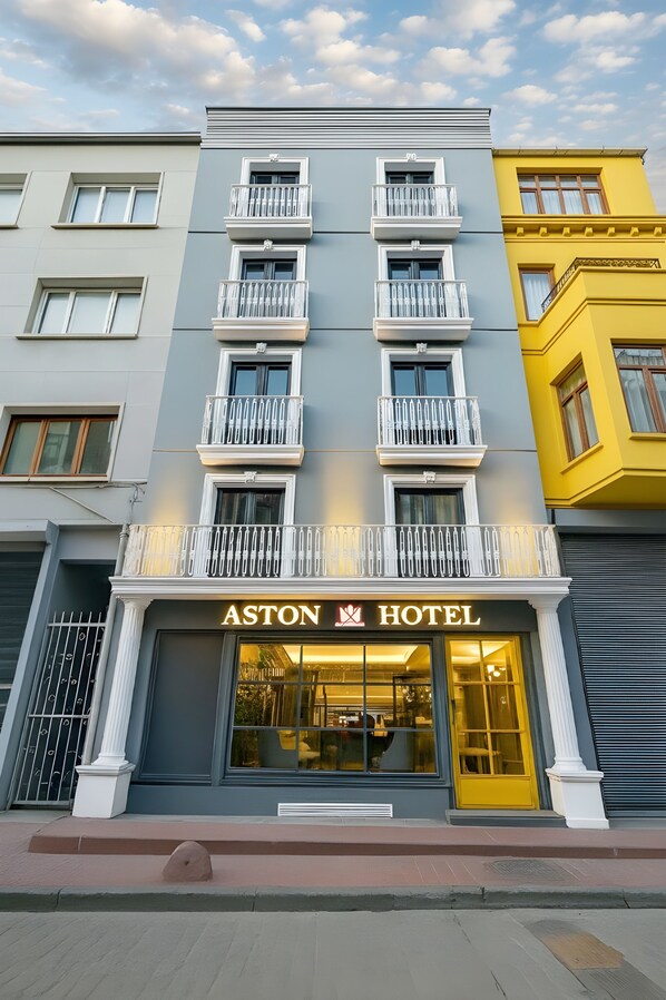 A multi-story hotel with a prominent 'ASTON HOTEL' sign, balconies, and a classic architectural style. - Aston Hotel Taksim (Istanbul)
