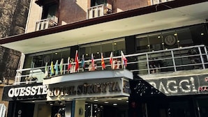 A multi-story hotel with balconies and a ground-level entrance. - Hotel Sureyya (Istanbul)