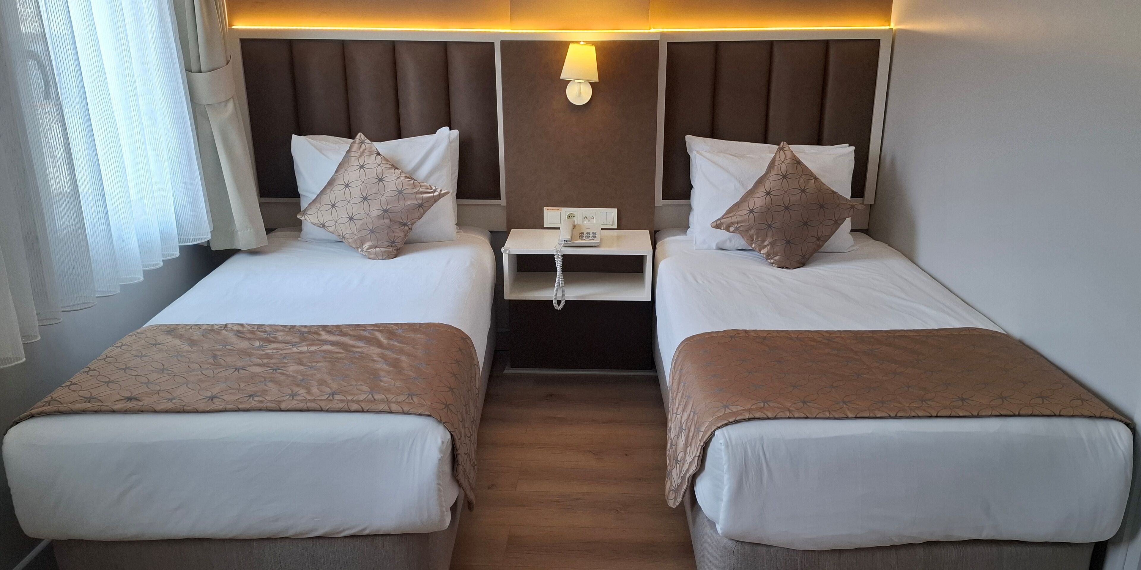 Dobbelt- eller tomannsrom – standard | Sengetøy av topp kvalitet, minibar, safe på rommet og wi-fi (inkludert)