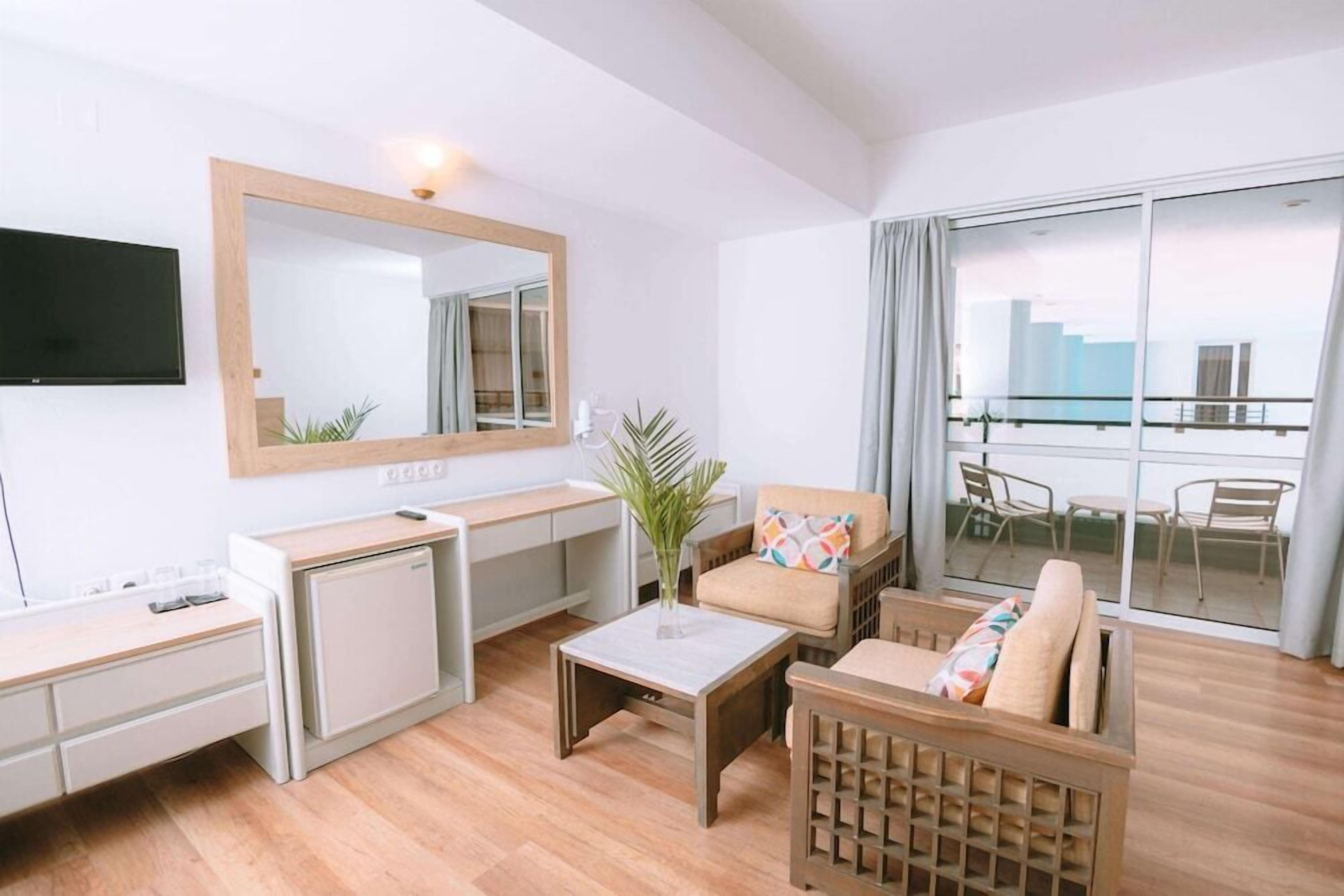 24-inch flat-screen TV with satellite channels, TV