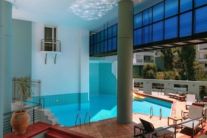 Outdoor pool, pool umbrellas, pool loungers