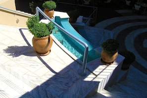 Outdoor pool, pool umbrellas, pool loungers