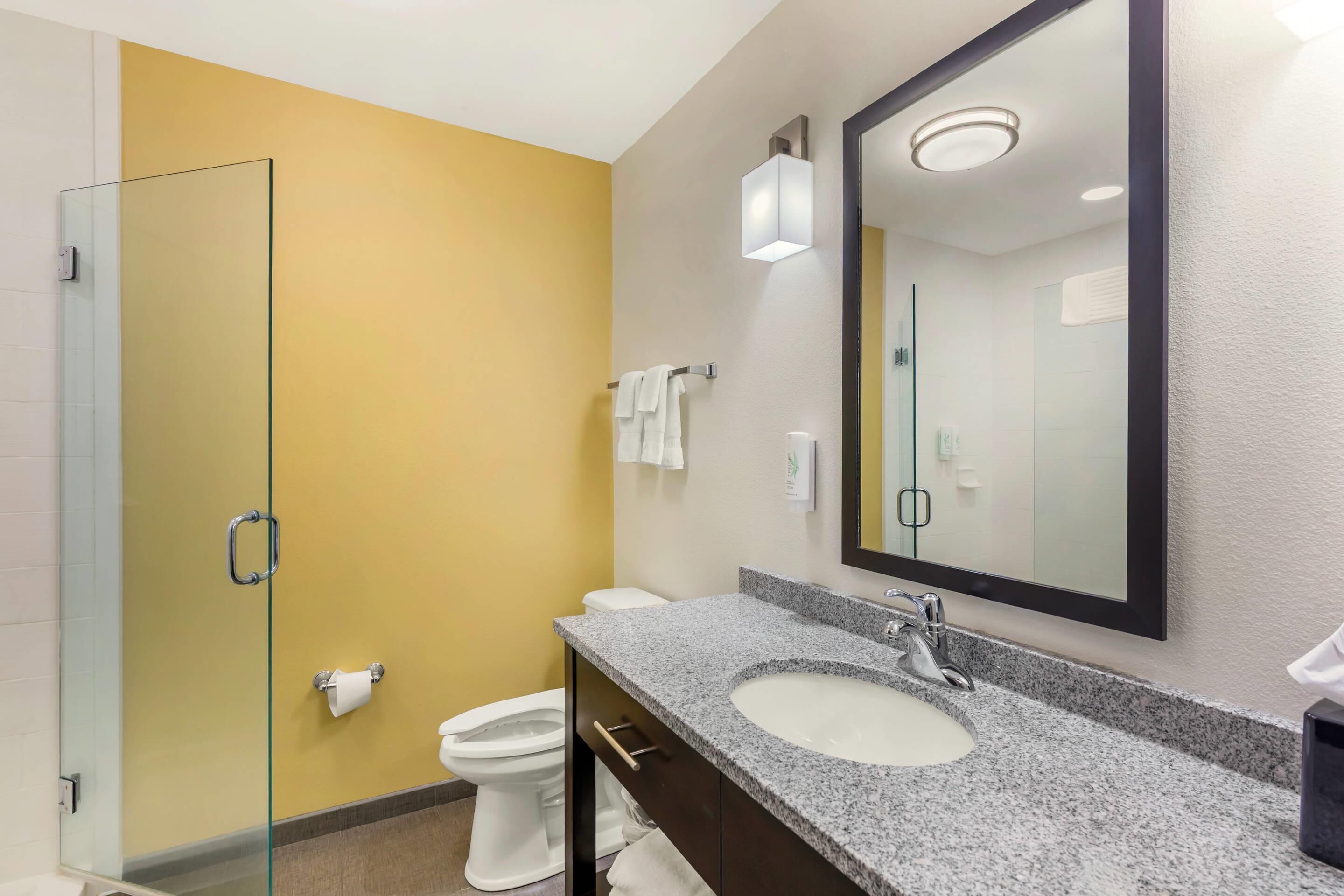 pillow-top beds, desk, blackout curtains, iron/ironing board