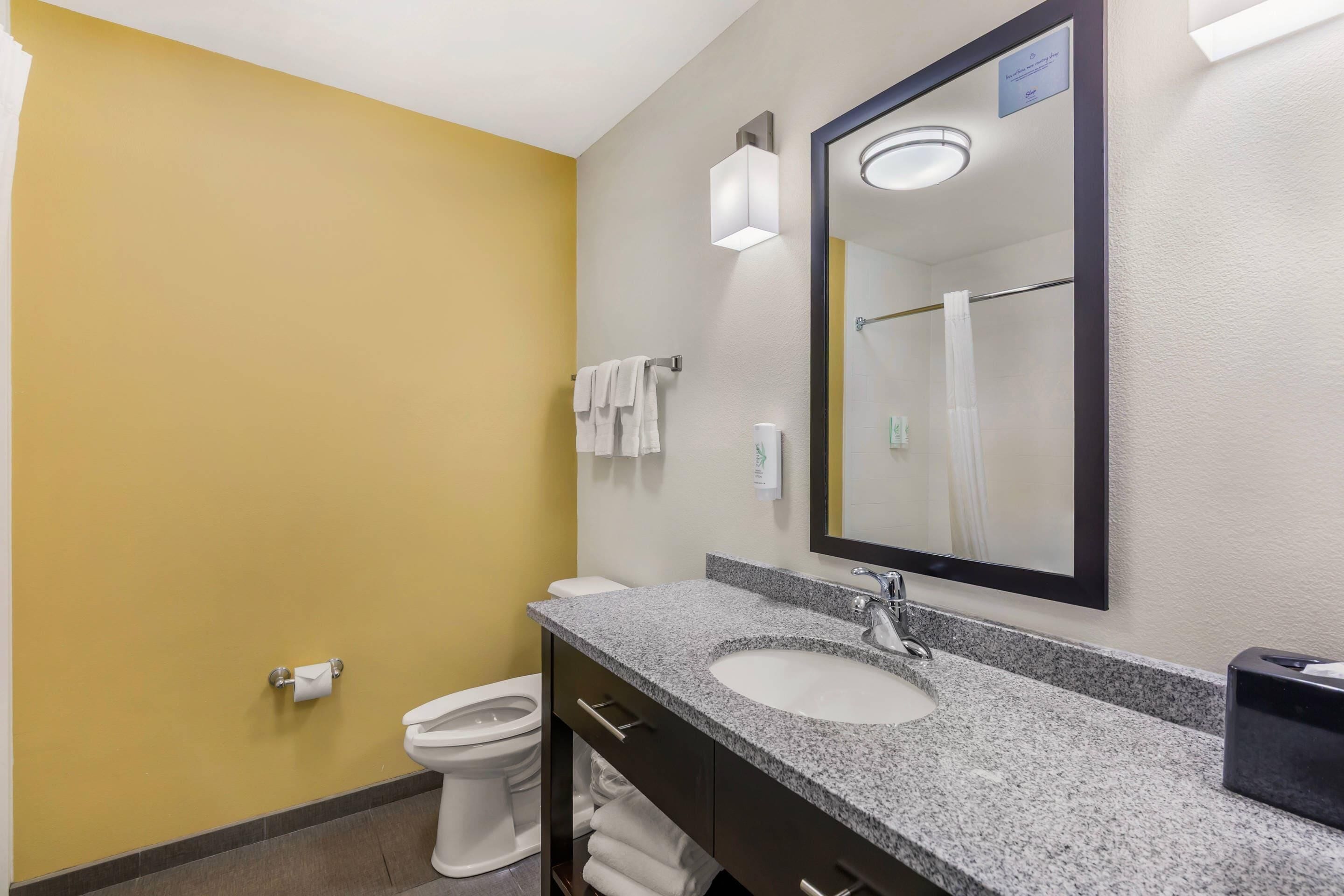 pillow-top beds, desk, blackout curtains, iron/ironing board