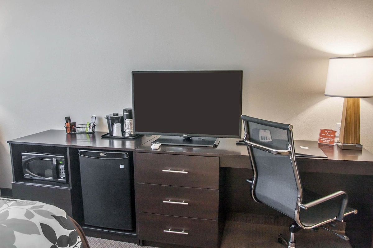 pillow-top beds, desk, blackout curtains, iron/ironing board