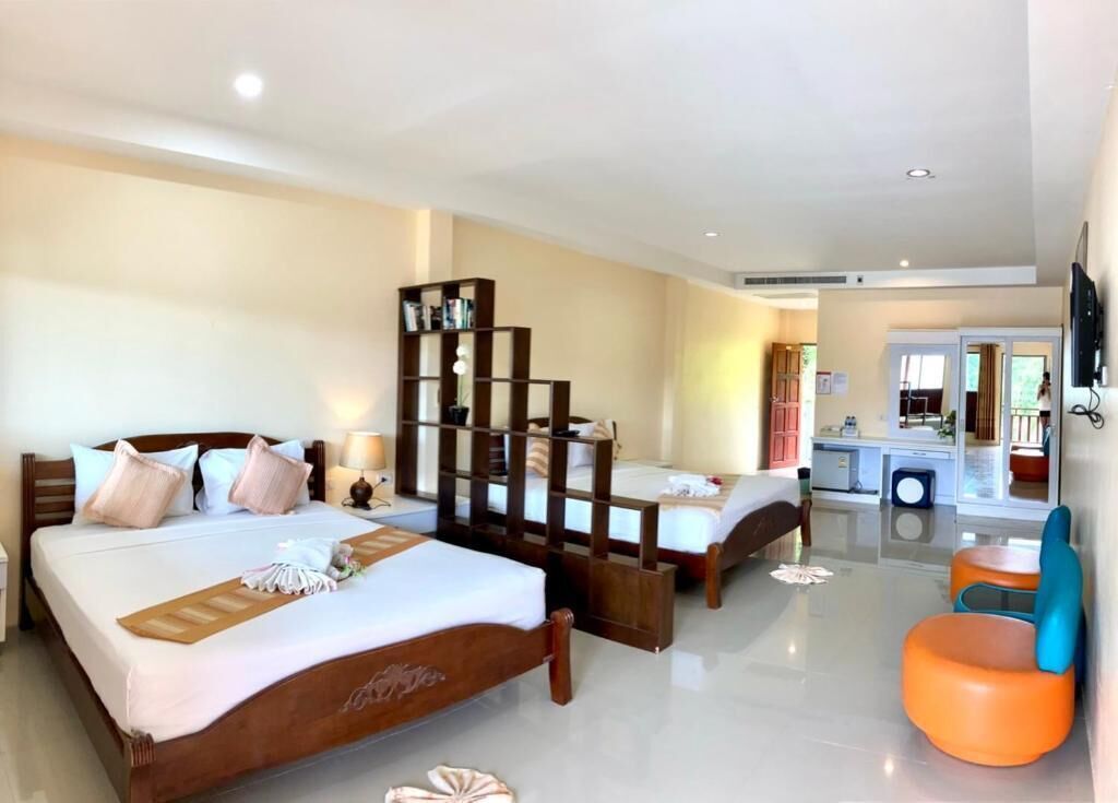 Deluxe Quadruple Room, Balcony, Partial Sea View