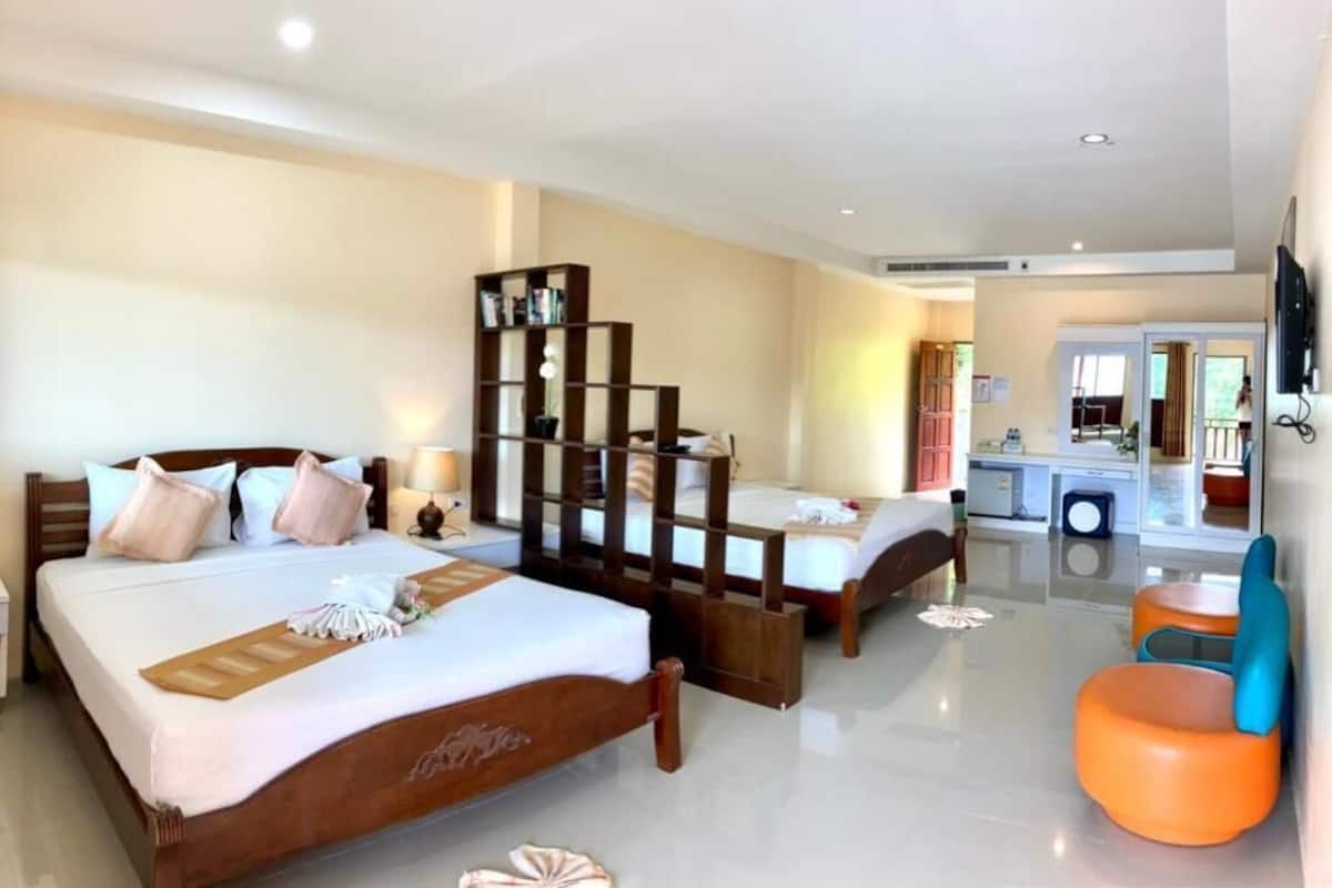 Deluxe Quadruple Room, Balcony, Partial Sea View