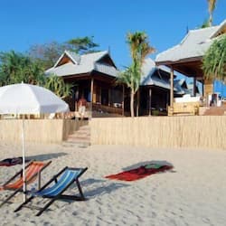 On the beach, sun-loungers, beach umbrellas
