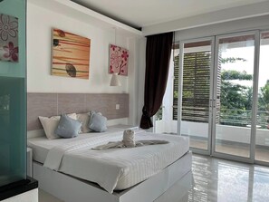 家庭套房, 2 间卧室, 海景 | 客房内保险箱、遮光窗帘、免费 WiFi、�床单