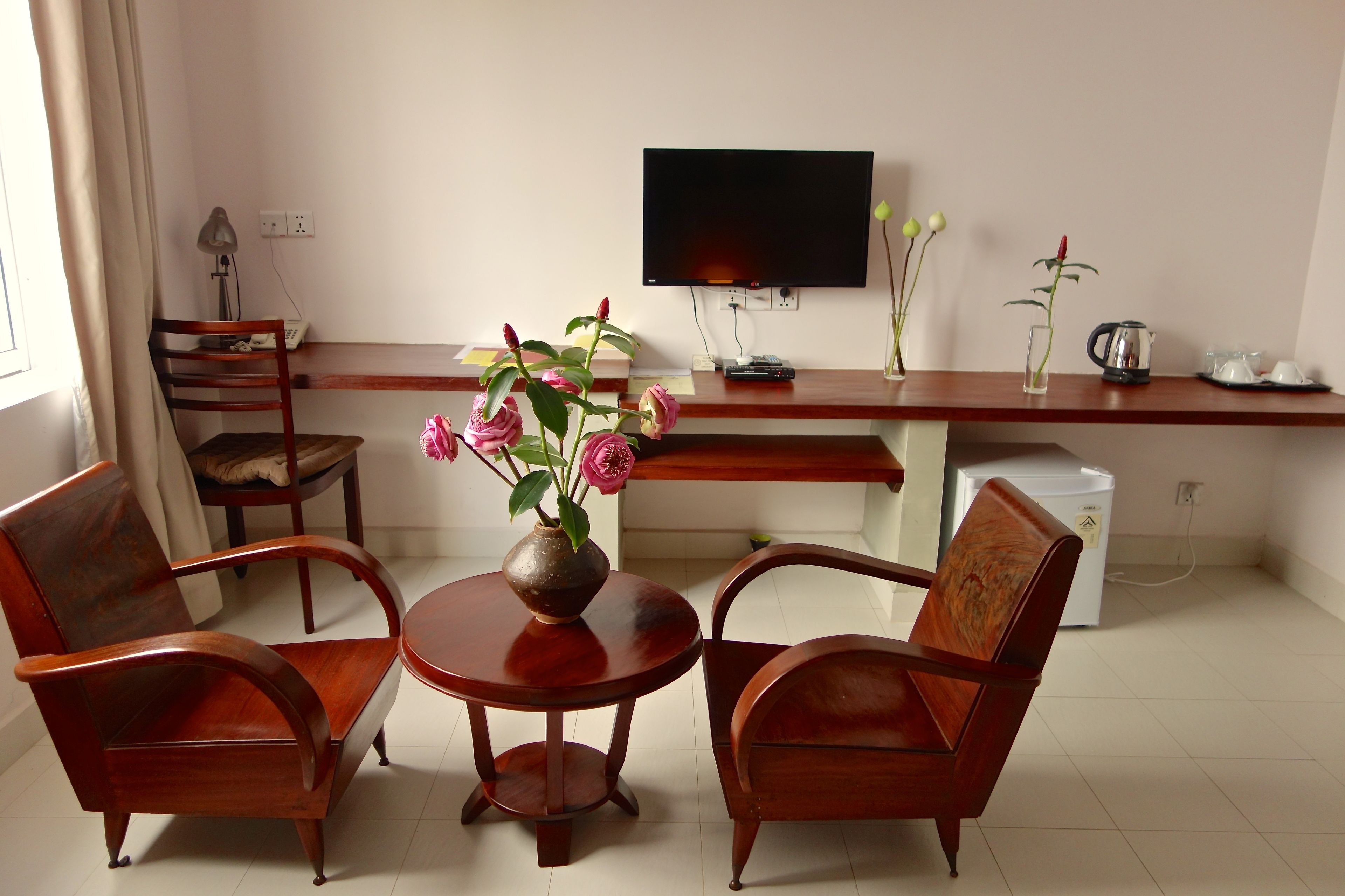 superior twin room | living area | 32-inch led tv with cable channels, tv, dvd player