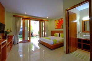 Junior Studio Suite, 1 King Bed, Pool View | Minibar, laptop workspace, free WiFi, bed sheets - Villa Mataano (Senggigi)