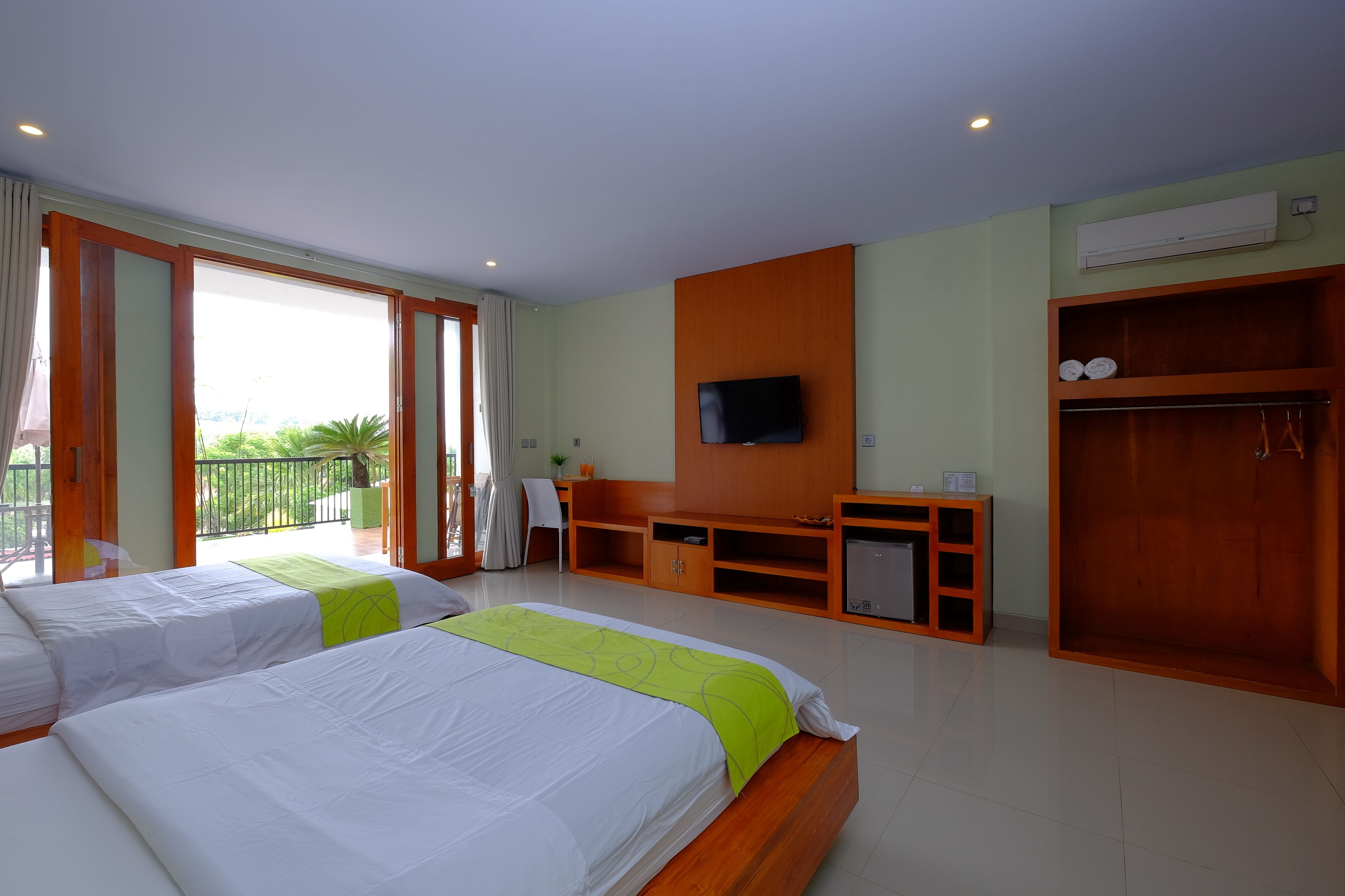 panoramic twin room, multiple beds, balcony, mountain view | minibar, laptop workspace, free wifi, bed sheets