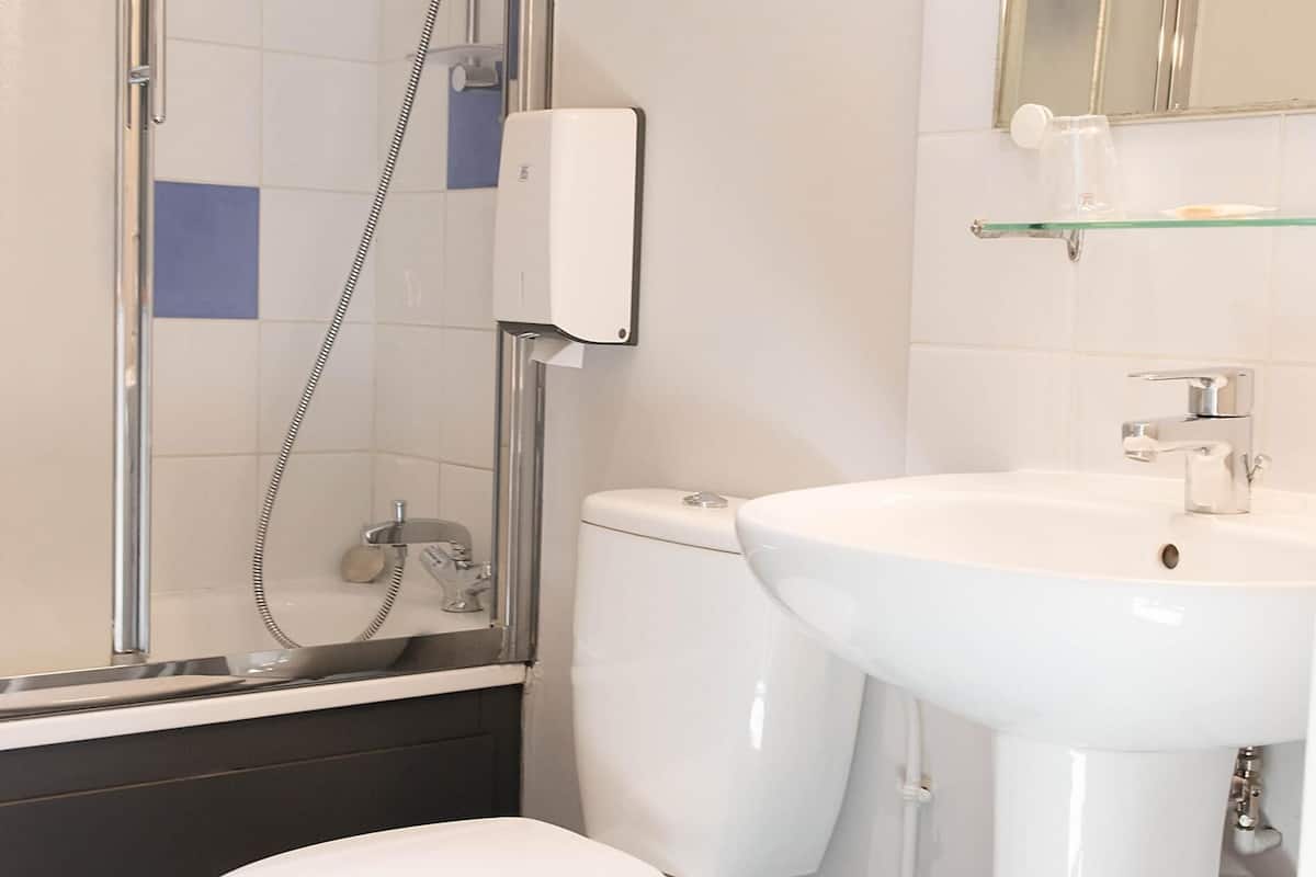 twin room | bathroom | hair dryer, towels, soap, shampoo