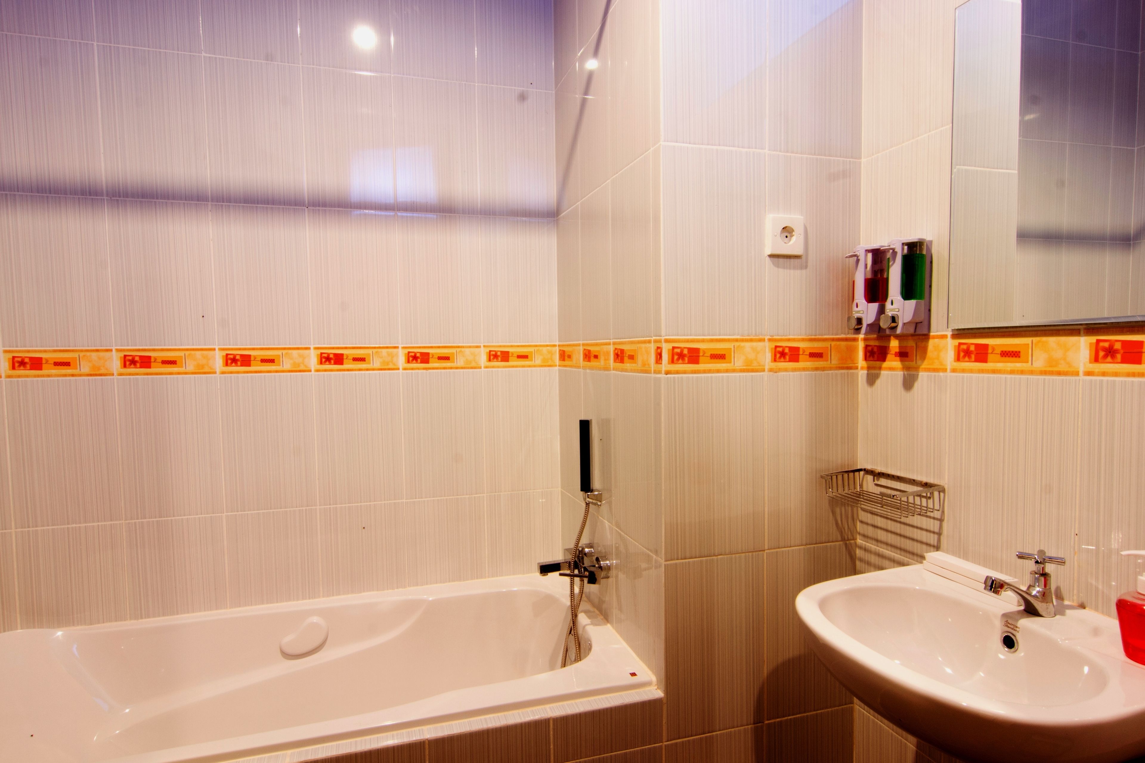 deluxe pool view "free one way airport transfer" | bathroom | shower, free toiletries, hair dryer, towels