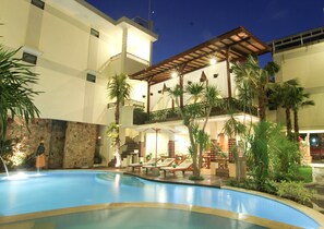 Outdoor pool, pool umbrellas, pool loungers
