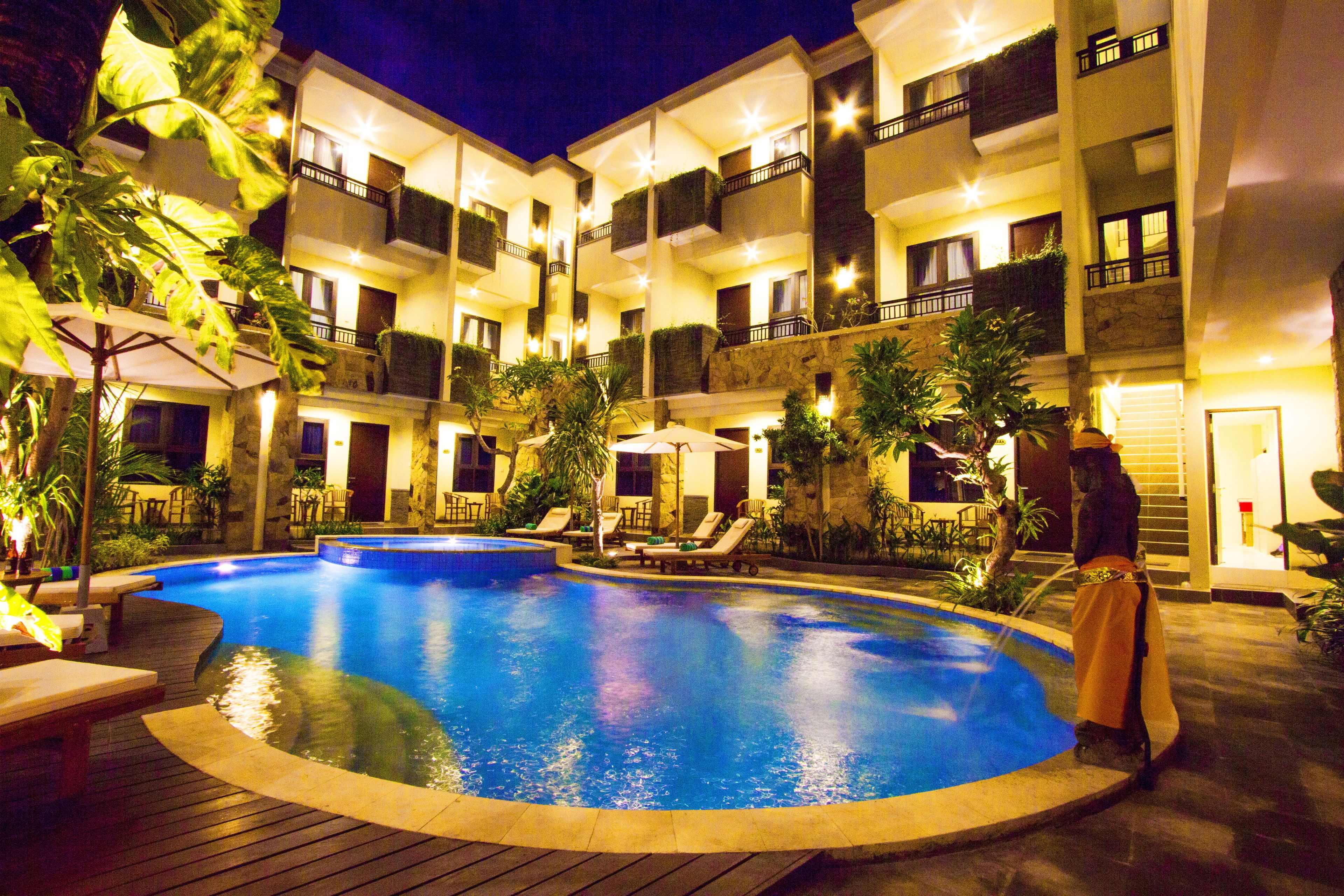 outdoor pool, pool umbrellas, pool loungers