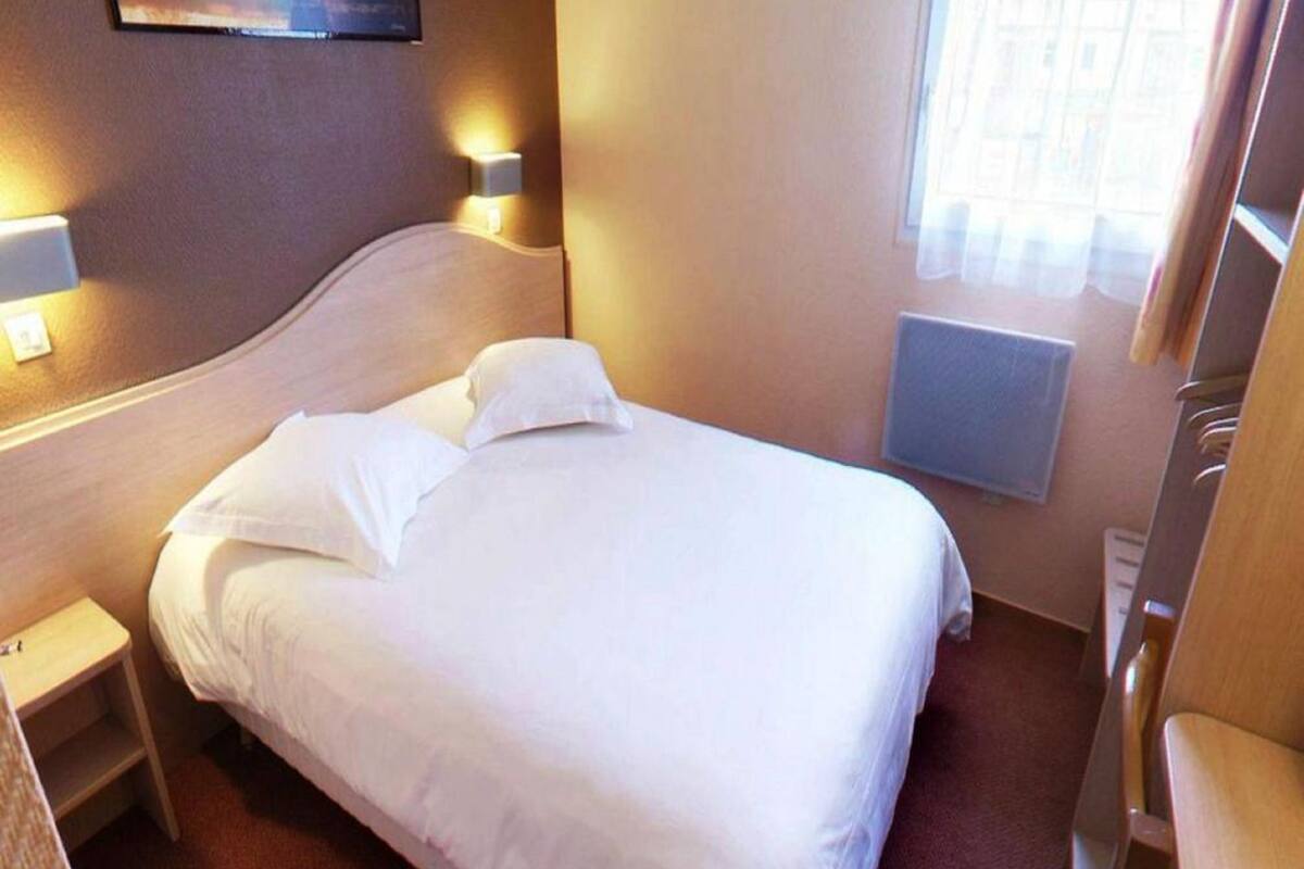 Habitación con 2 camas individuales | Escritorio, sistema de insonorización, cunas gratuitas y wifi gratis