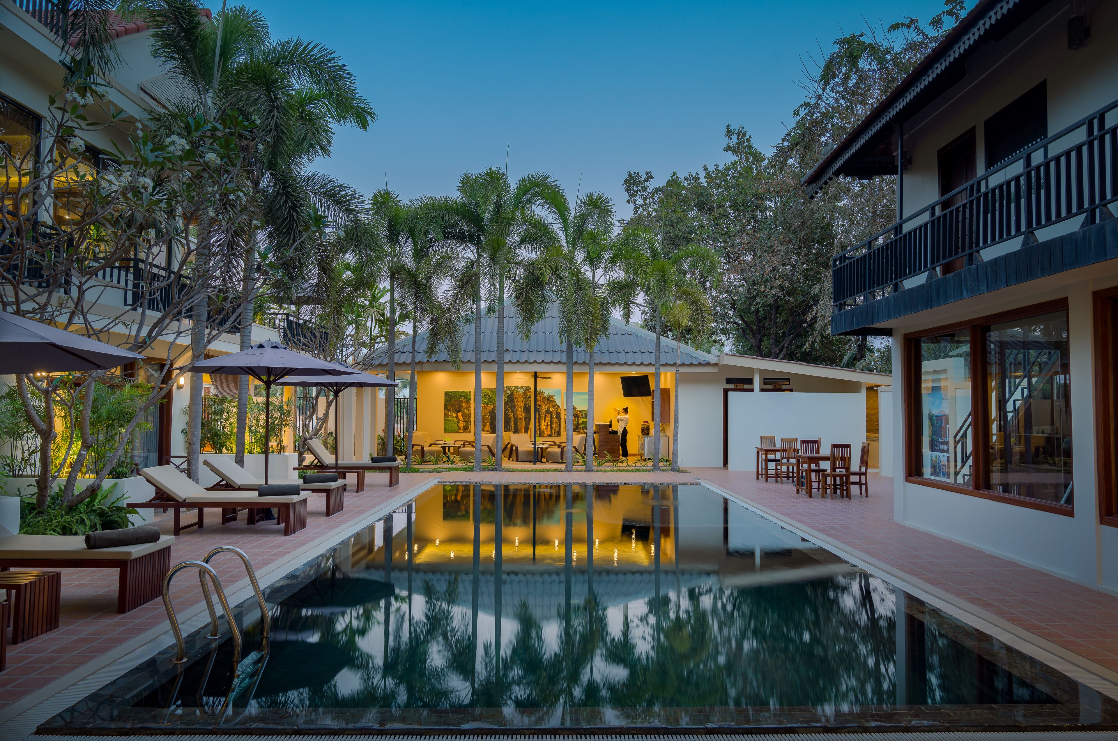 Outdoor pool, open 6:00 AM to 7:00 PM, pool loungers
