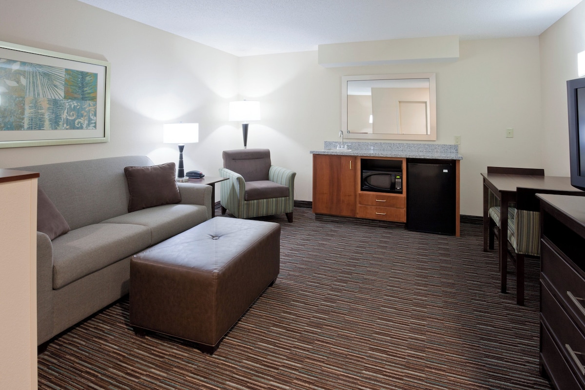 Suite, 2 Queen Beds | Desk, blackout curtains, iron/ironing board, free cots/infant beds