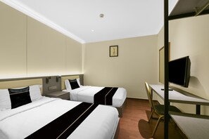 A hotel room with two beds, a desk, a chair, a television, and a picture on the wall. - Hotel O GHC Near Penang Street Art (George Town)