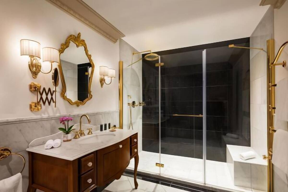 Bathroom | Designer toiletries, hair dryer, bathrobes, slippers