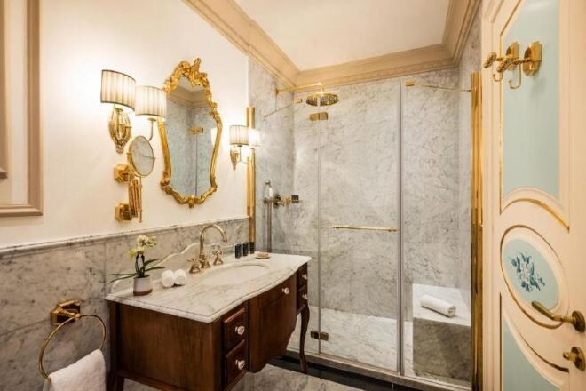 Bathroom | Designer toiletries, hair dryer, bathrobes, slippers