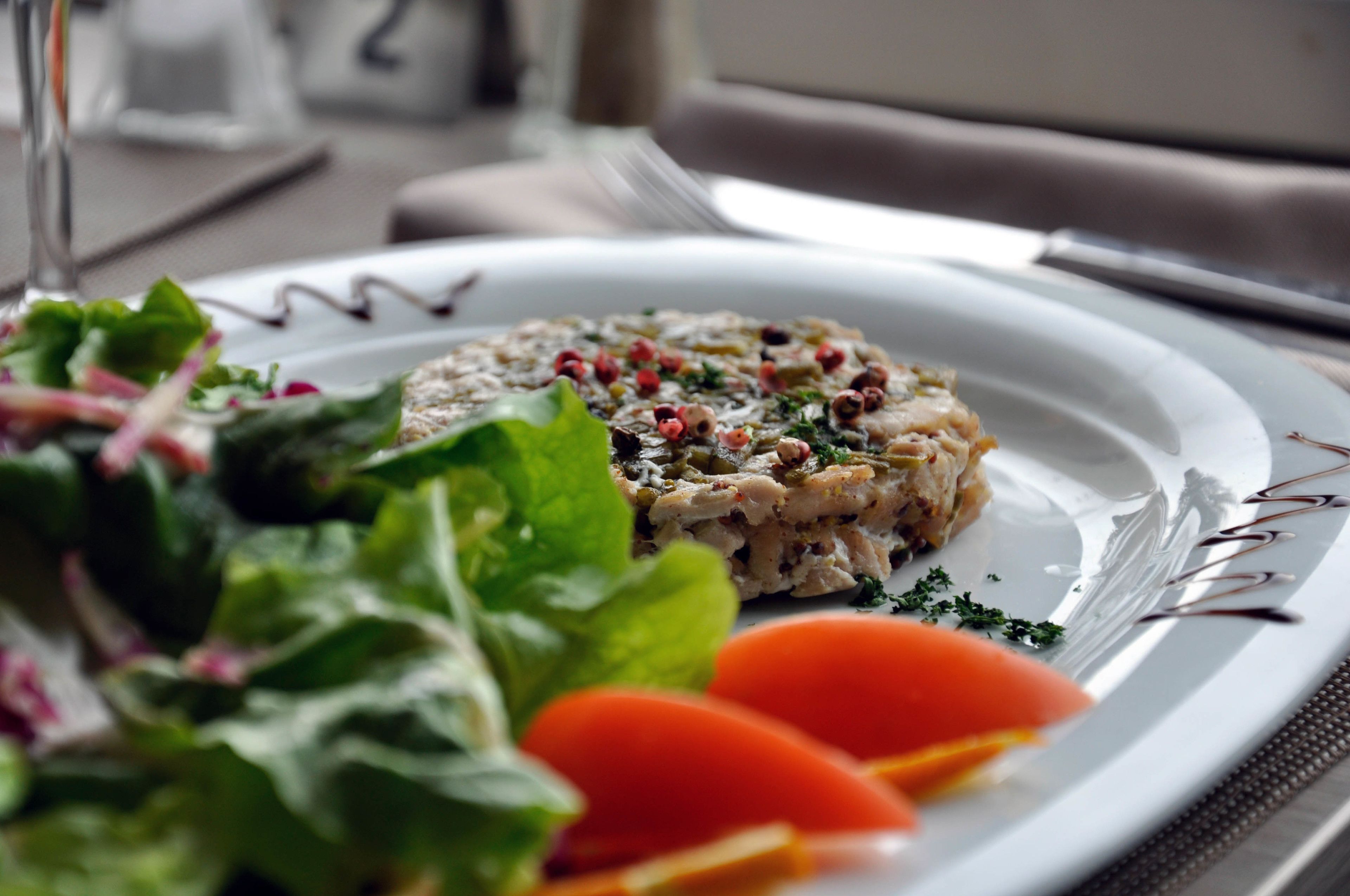 A plate with food and a fork.