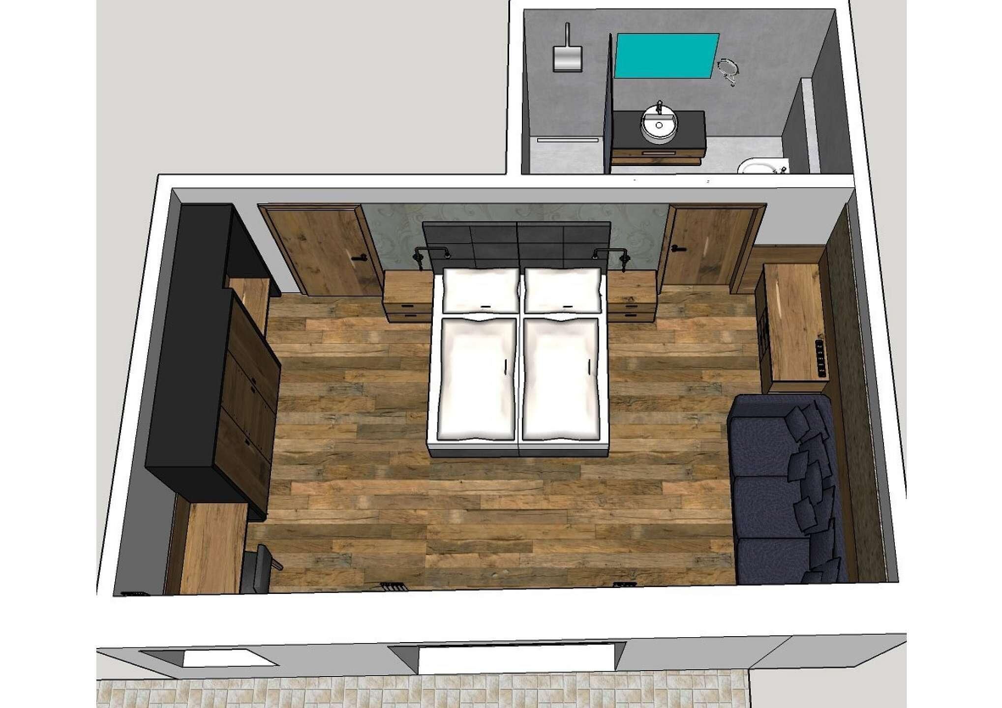 A bedroom with a bed, a sofa, a small table, and a wardrobe.