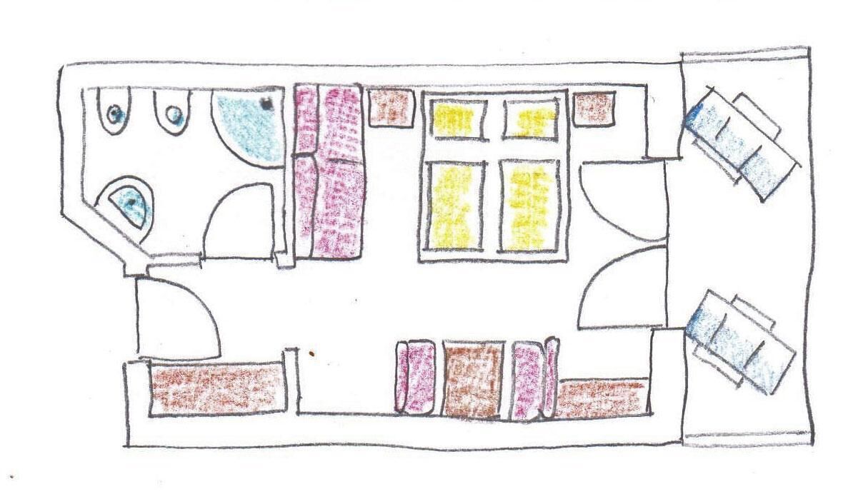 Un plano sencillo de una habitación de hotel con una cama, un escritorio, una silla, una ventana y una puerta.
