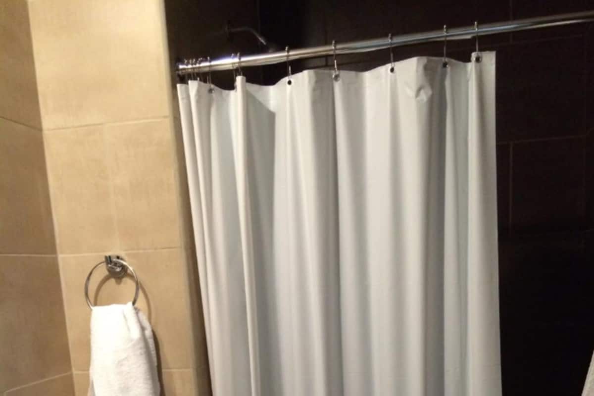 shower, rainfall showerhead, hair dryer, towels