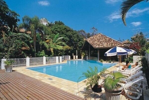 Outdoor pool, pool umbrellas, sun loungers