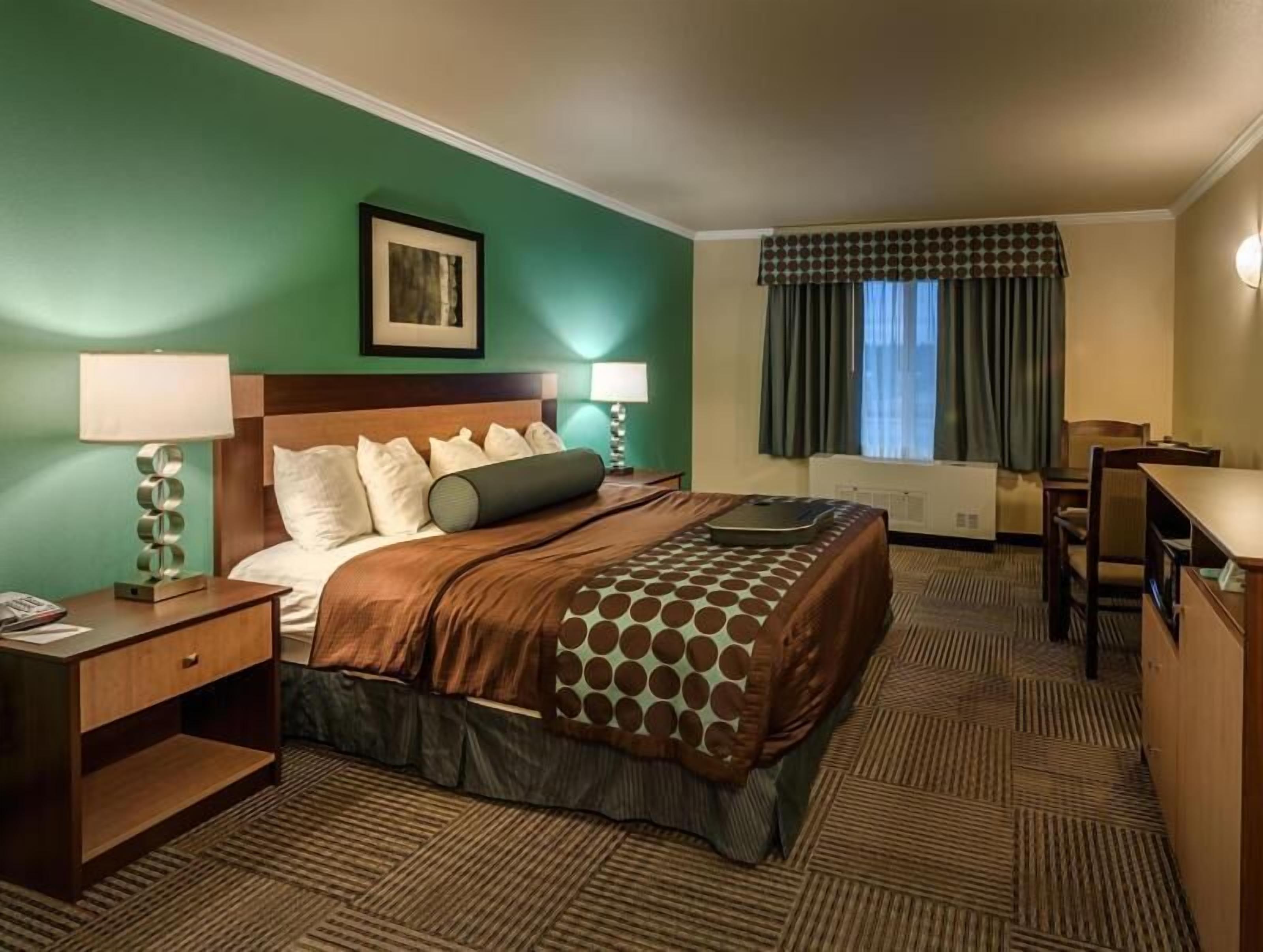 Pillow-top beds, desk, laptop workspace, blackout curtains