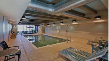Indoor pool, open 9:00 AM to 10:00 PM, pool loungers