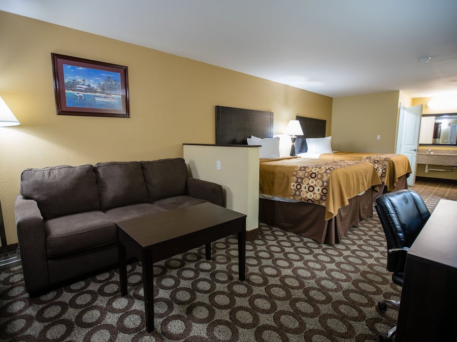 Suite, 2 Queen Beds, Non Smoking, No Pets | Premium bedding, desk, iron/ironing board, cribs/infant beds