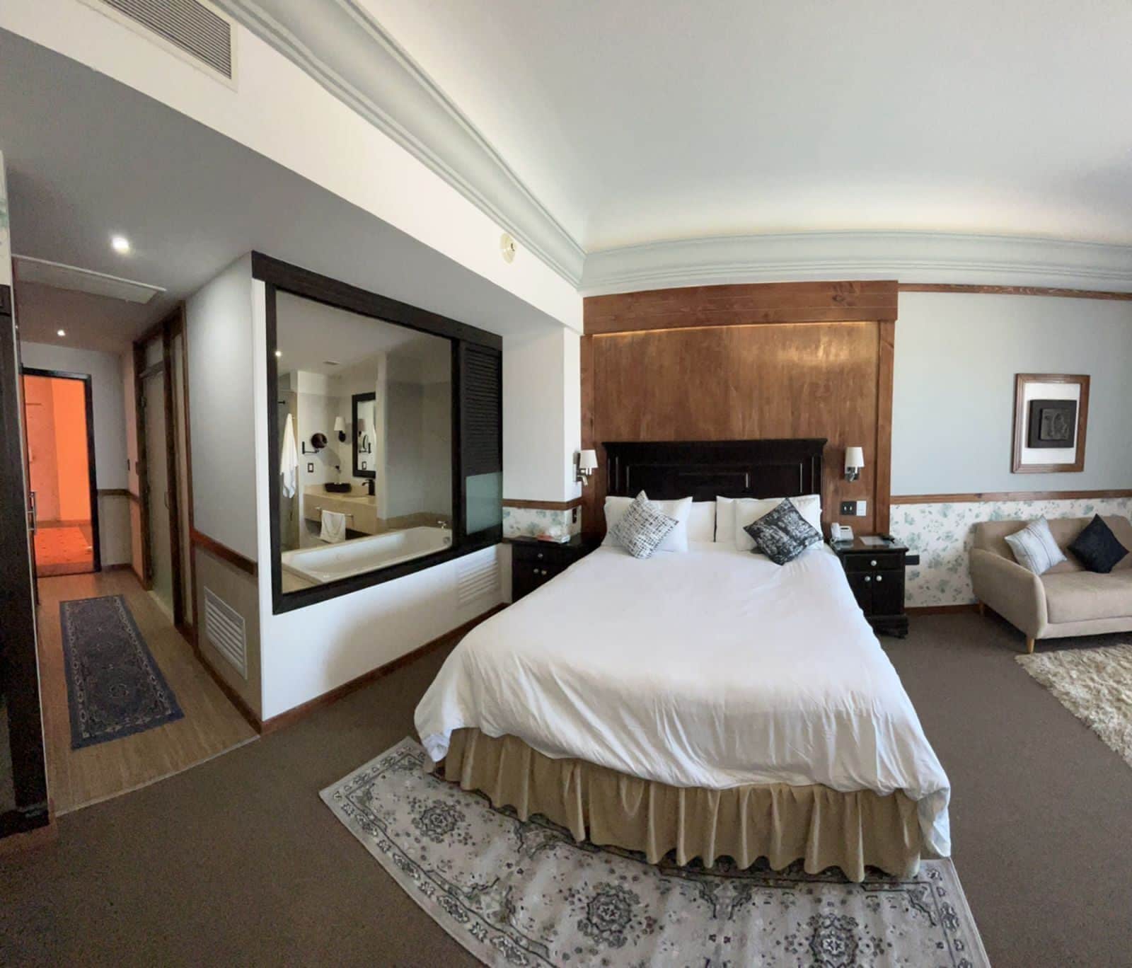 premium studio suite, 1 king bed, hot tub, sea view | 1 bedroom, minibar, in-room safe, individually decorated