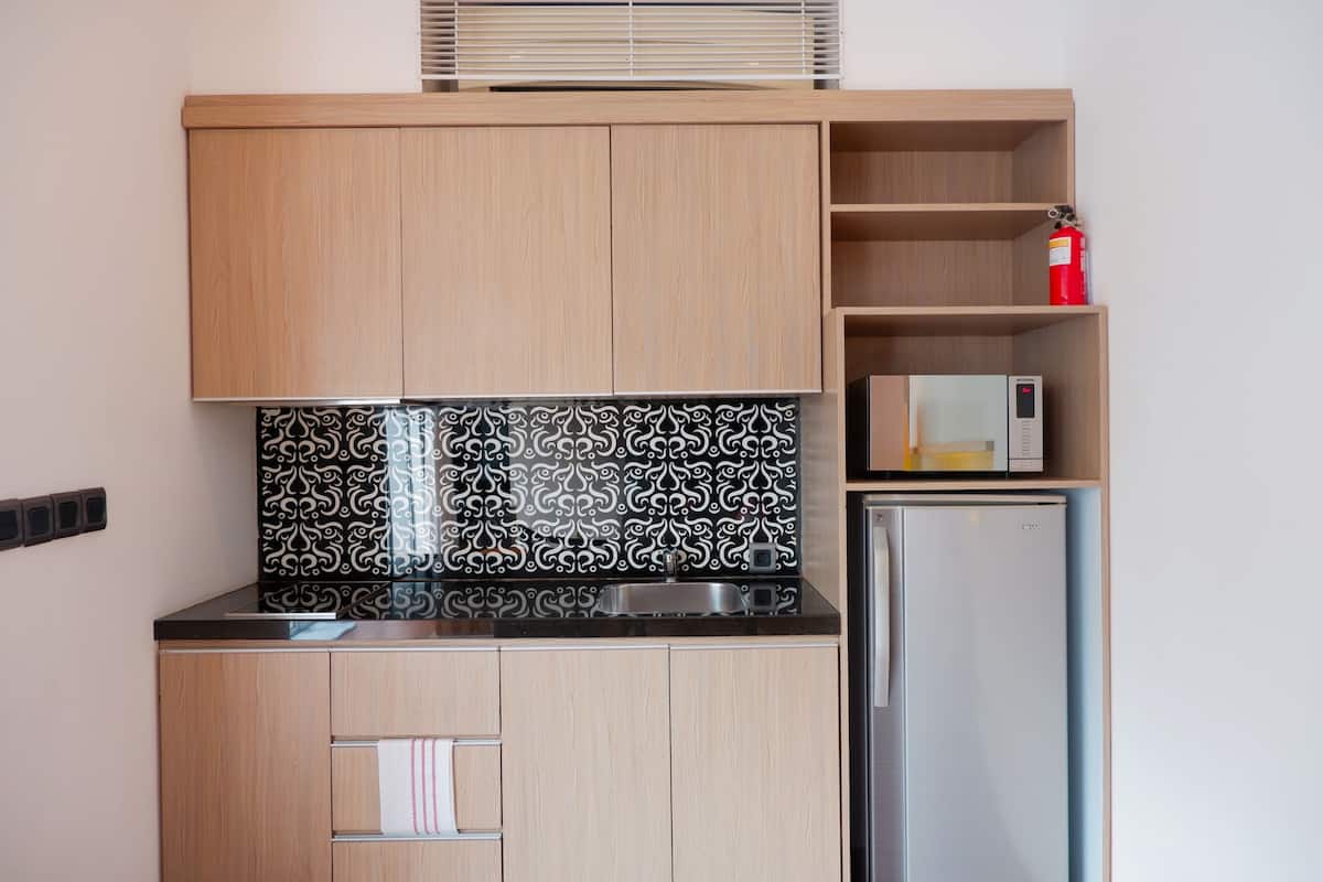 one bedroom residence with private pool | private kitchen | full-sized fridge, microwave, stovetop, coffee/tea maker