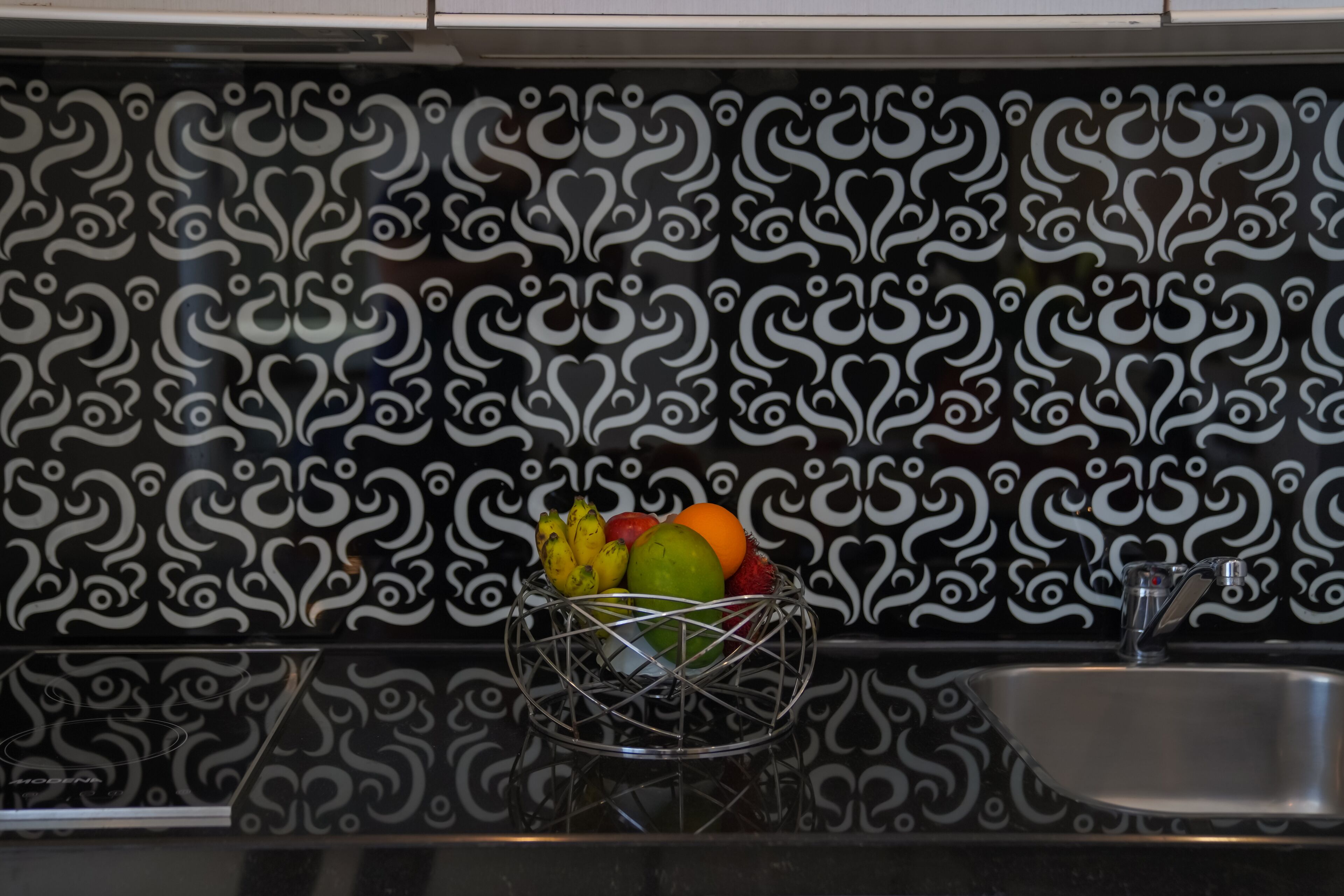 full-sized fridge, microwave, stovetop, coffee/tea maker