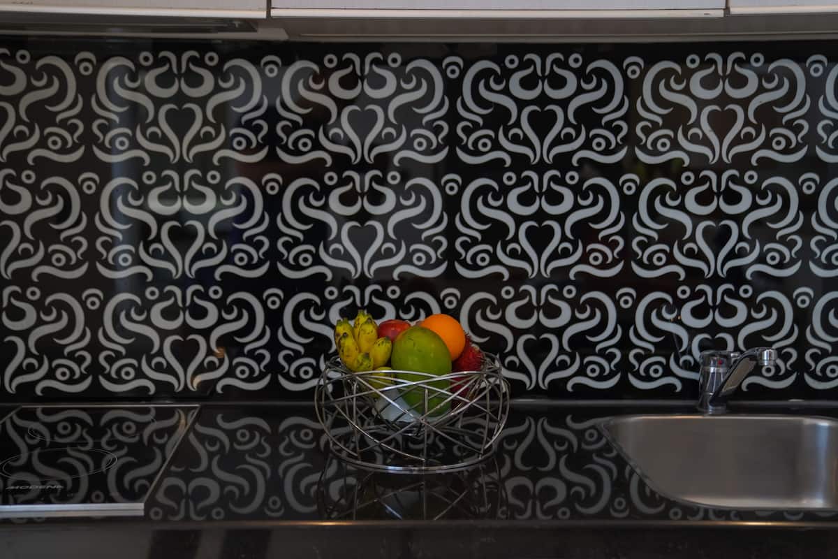 full-sized fridge, microwave, stovetop, coffee/tea maker