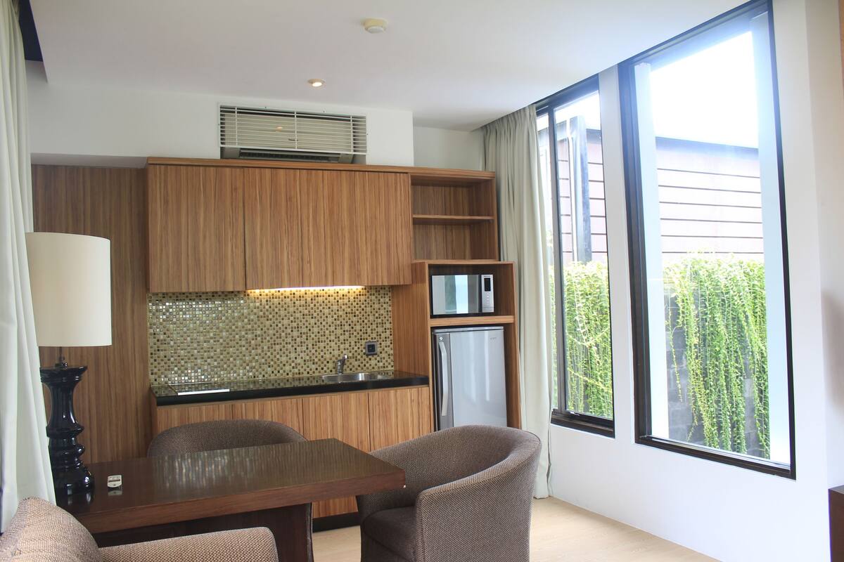 one bedroom residence | private kitchenette | full-sized fridge, microwave, stovetop, coffee/tea maker