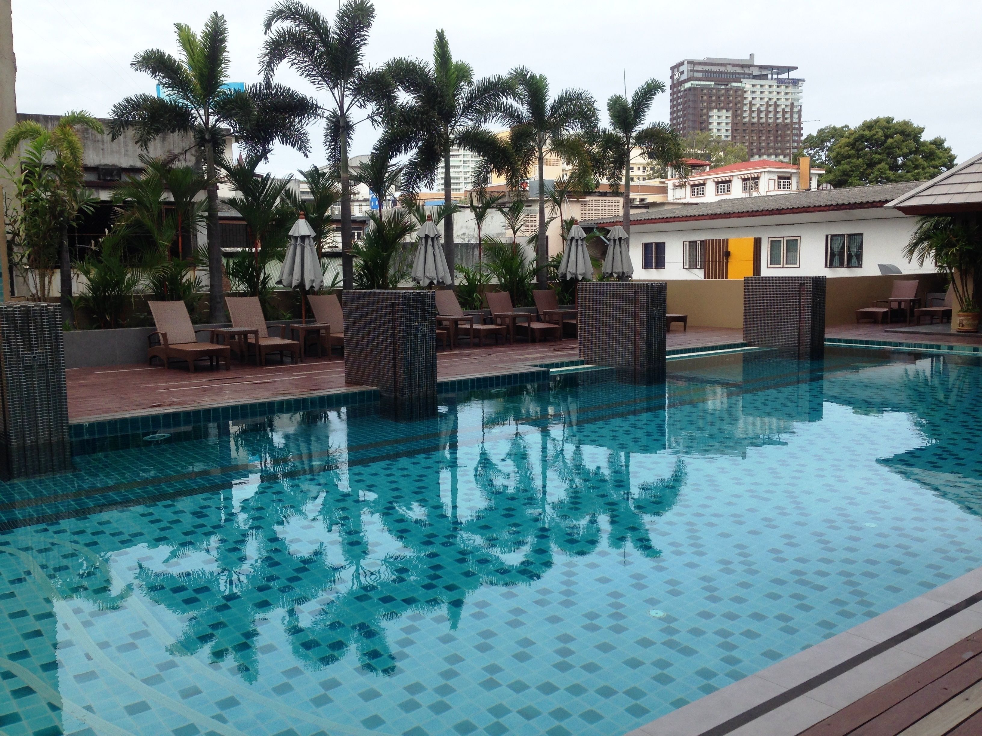 outdoor pool, pool umbrellas, pool loungers