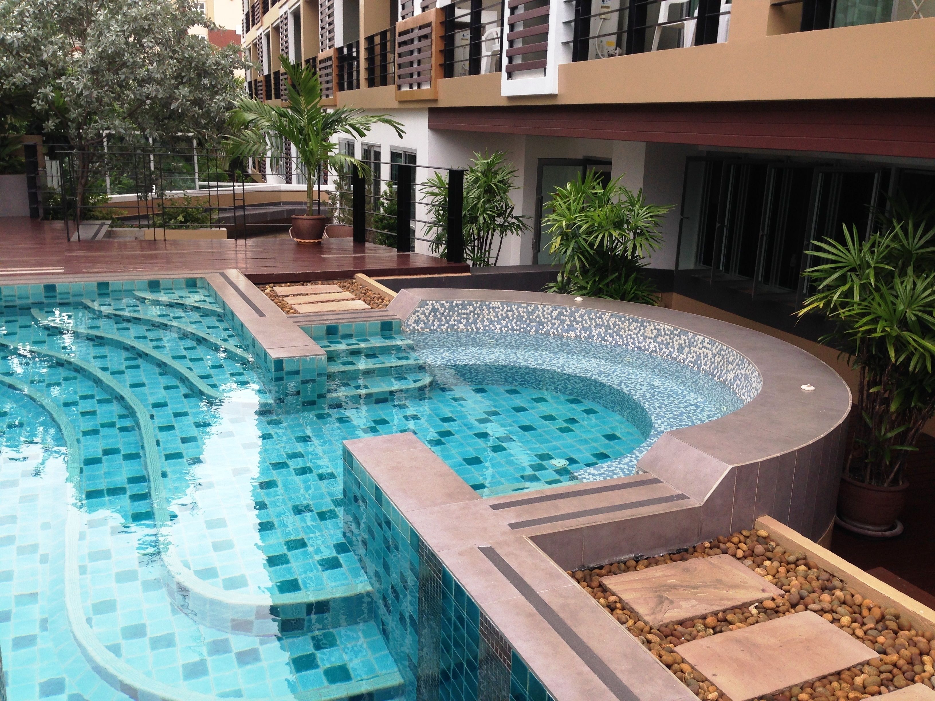 outdoor pool, pool umbrellas, pool loungers