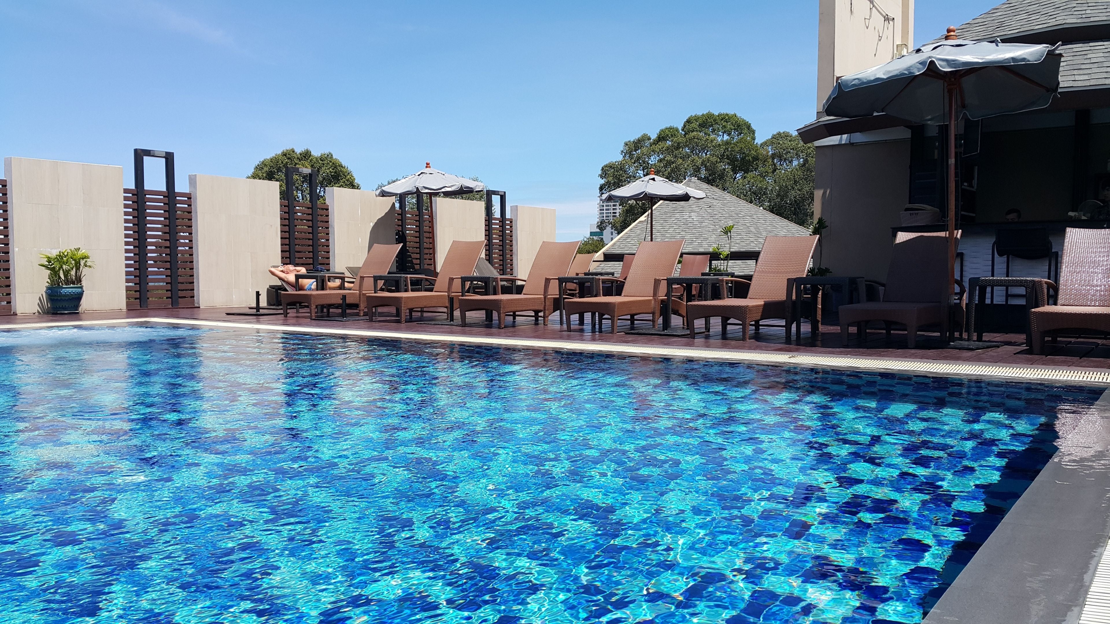 outdoor pool, pool umbrellas, pool loungers