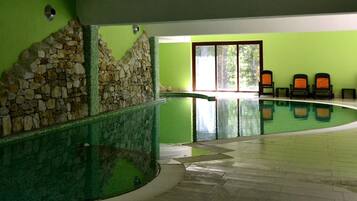 Indoor pool, open 9:00 AM to 7:30 PM, pool loungers