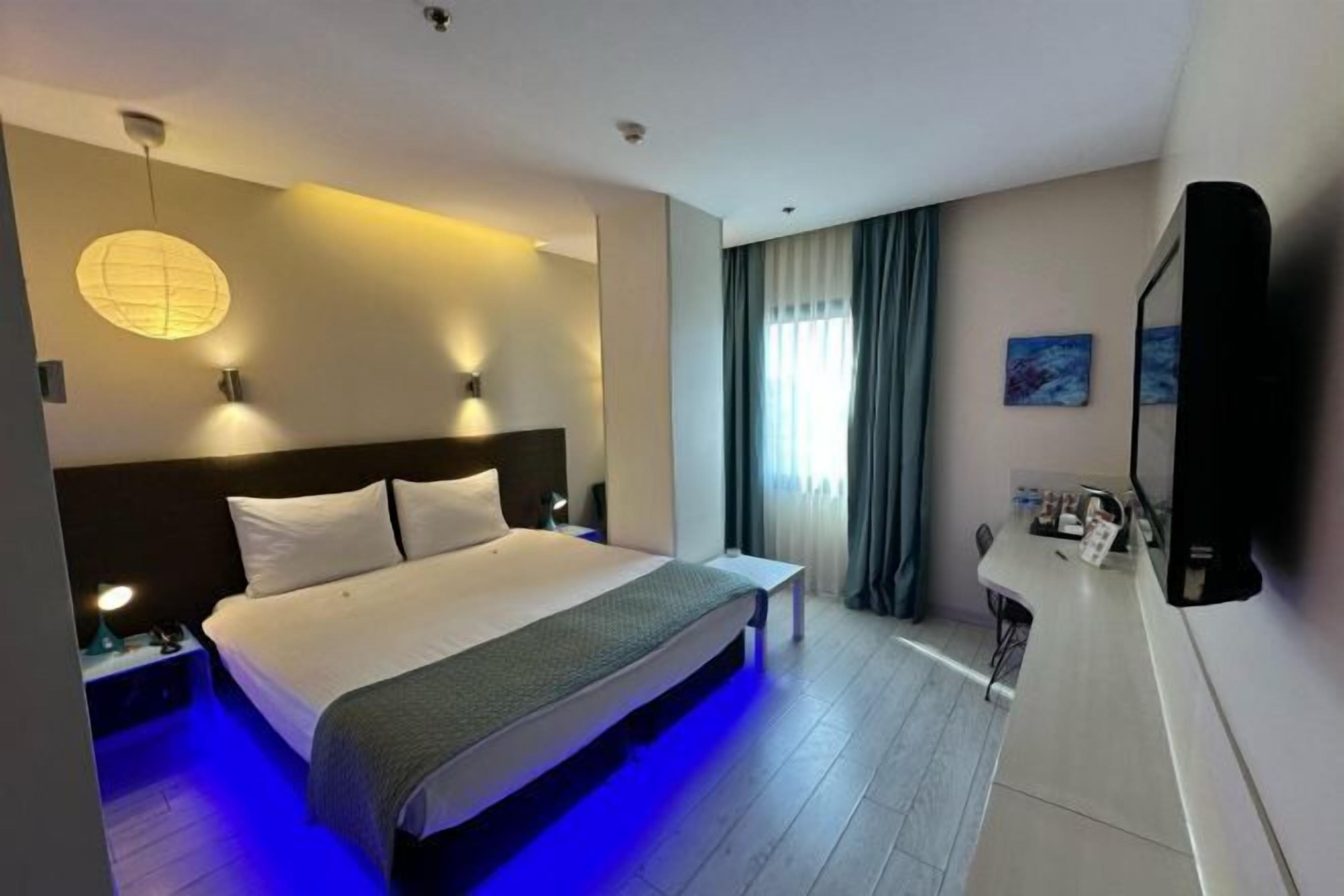 Premium bedding, free minibar items, in-room safe, desk