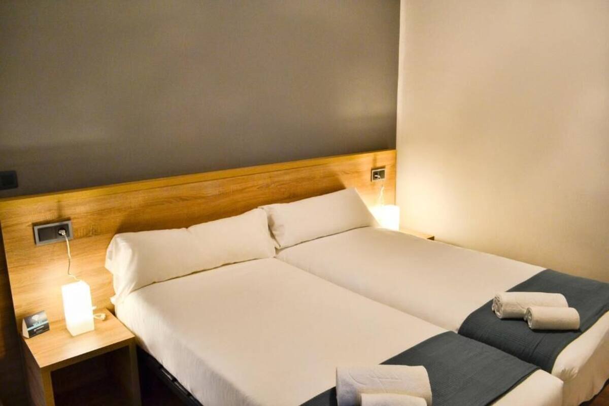 Desk, iron/ironing board (on request), WiFi (free), bed sheets